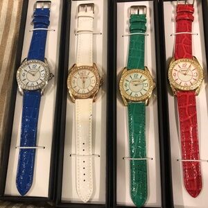 Ladies Manhattan by Croton Gold Tone Paved.  Leather bands-red,white,green,blue